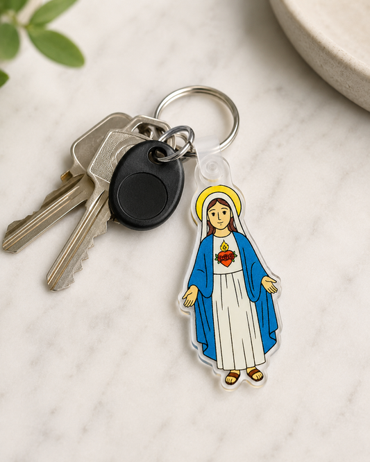A die-cut acrylic keychain featuring a stylized illustration of the Immaculate Heart of Mary on a set of keys