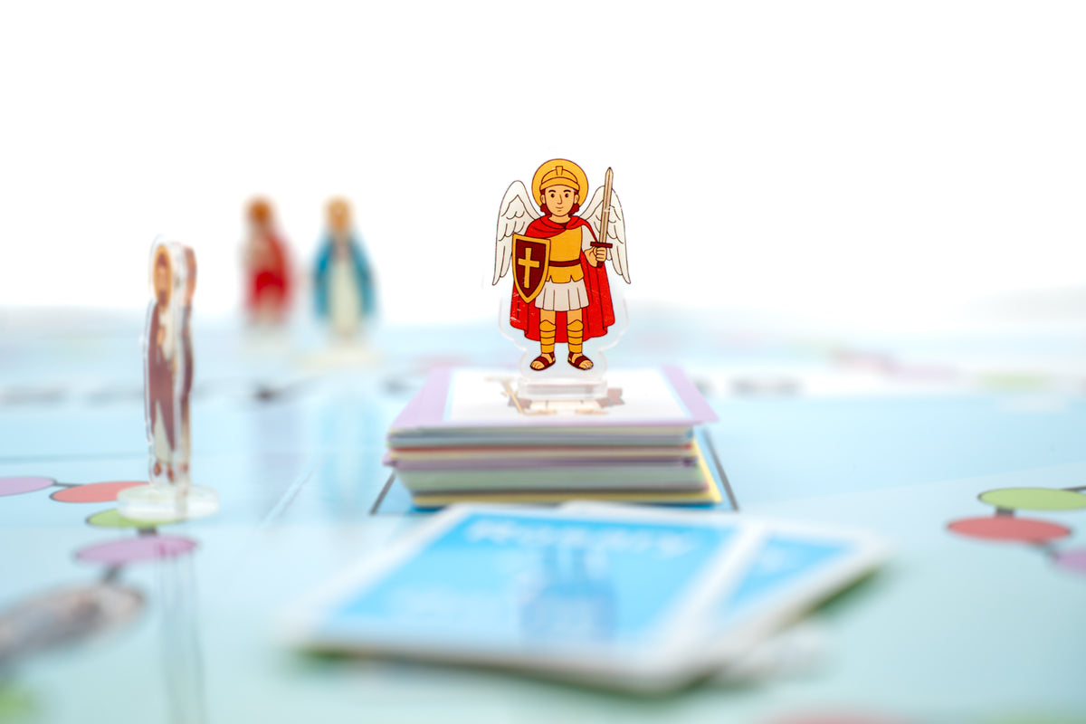 Acrylic saint figures included in the Rosary Game