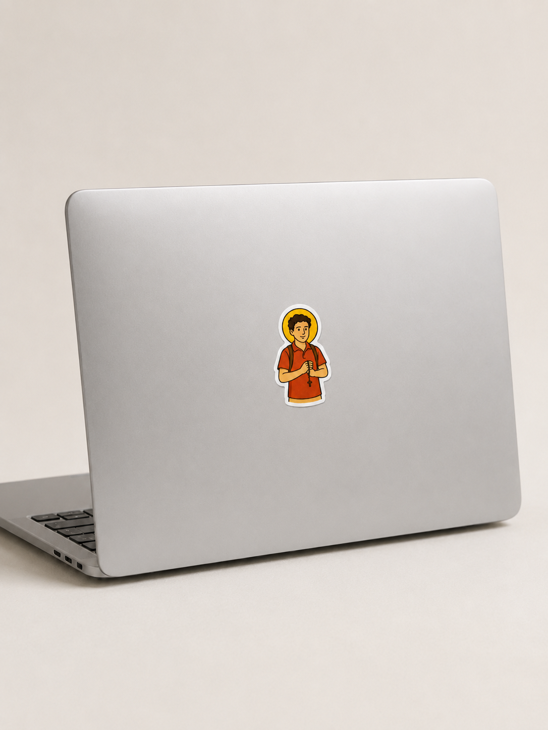 St. Carlo Acutis vinyl sticker on a computer